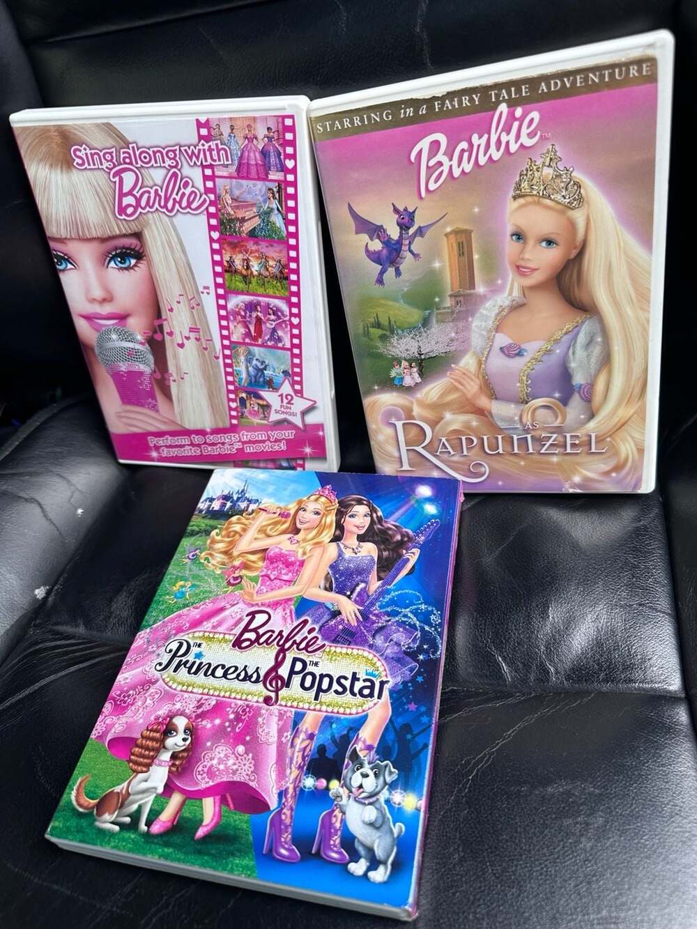 Lot of 3 Barbie DVDs: Sing Along with Barbie, Barbie as Rapunzel, and Barbie The